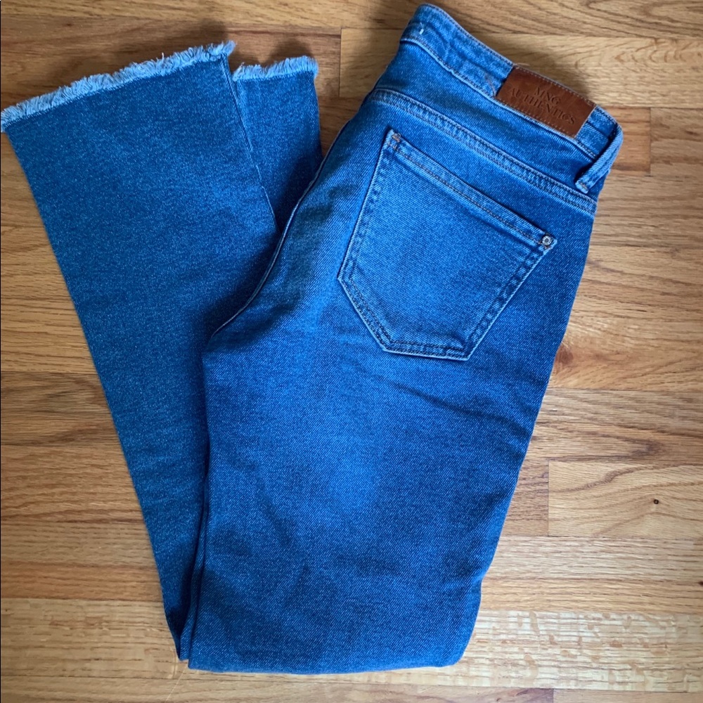 ASOS Split front flare blue jeans.